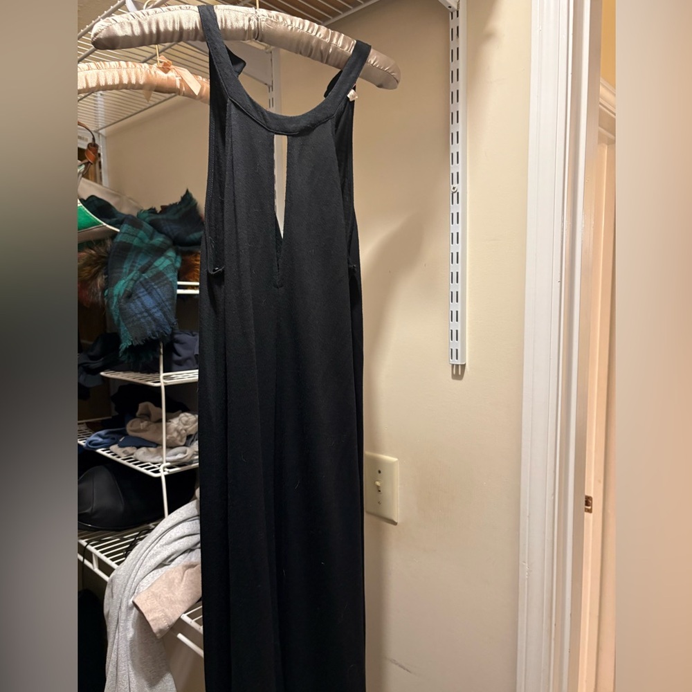 Black Sleeveless Maxi Dress with front slit at the bottom of the dress.